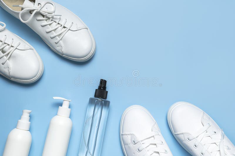 White Leather Sneakers, Plastic Bottles of Cleaning Products for Shoes on  Blue Background Flat Lay Top View. Natural Leather Shoe Stock Image - Image  of laces, leather: 210044861