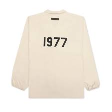 Fear of God Essentials 1977 Wheat Coaches Jacket